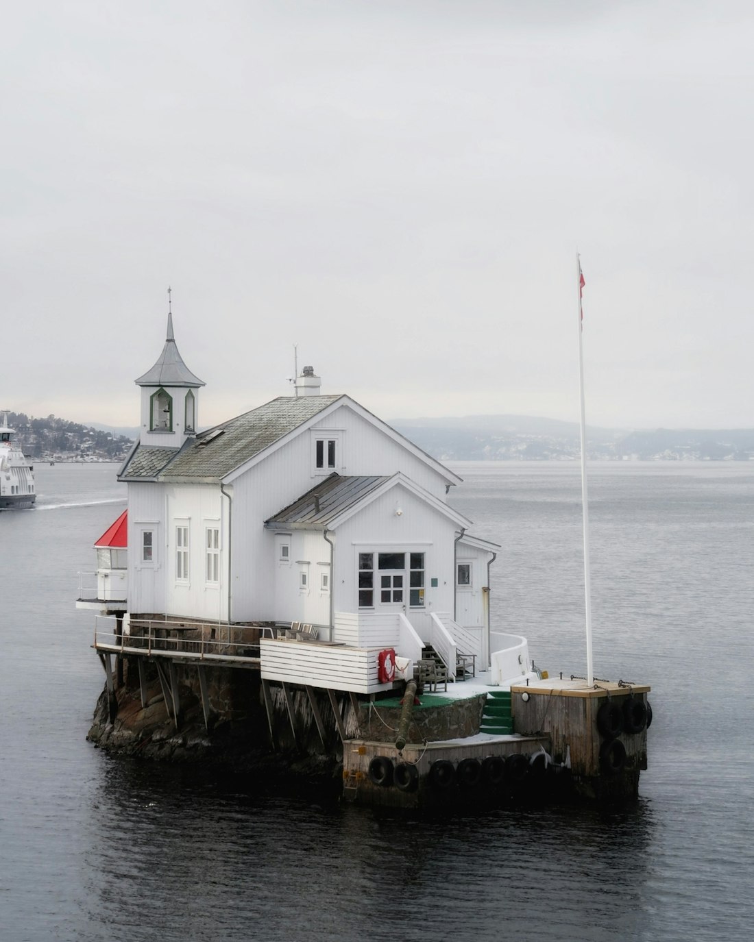 The old lido pavilion above the rocks